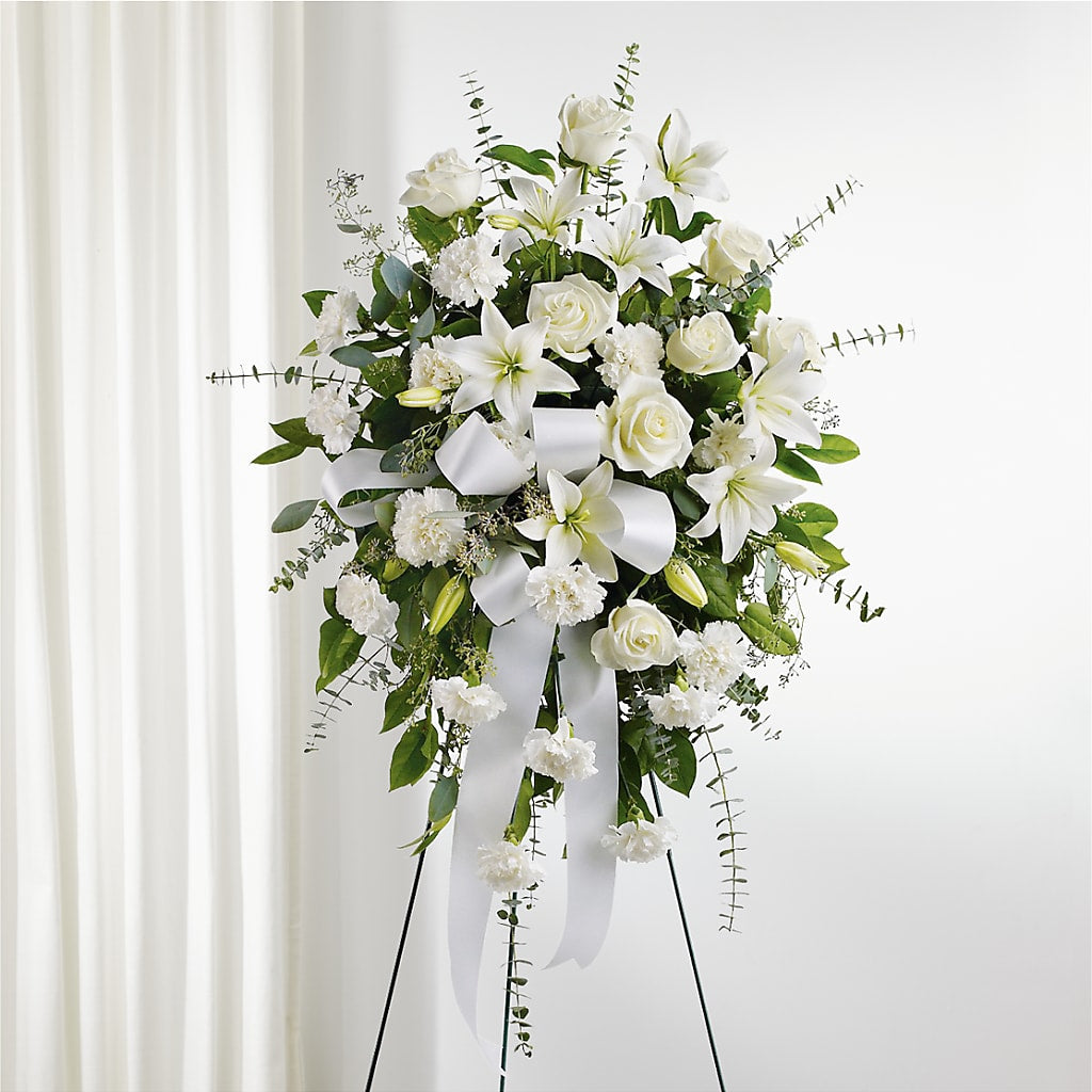 With Care Standing Spray – Normandy Flower Shop, Inc., Muncie IN